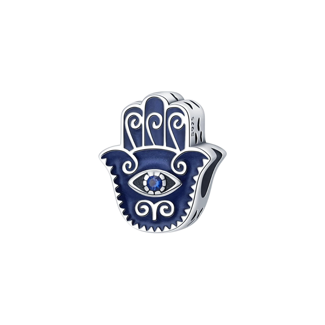 Midnight Blue Hamsa Hand Evil Eye Charm with intricate silver filigree and blue stone eye, showcasing protective symbolism.