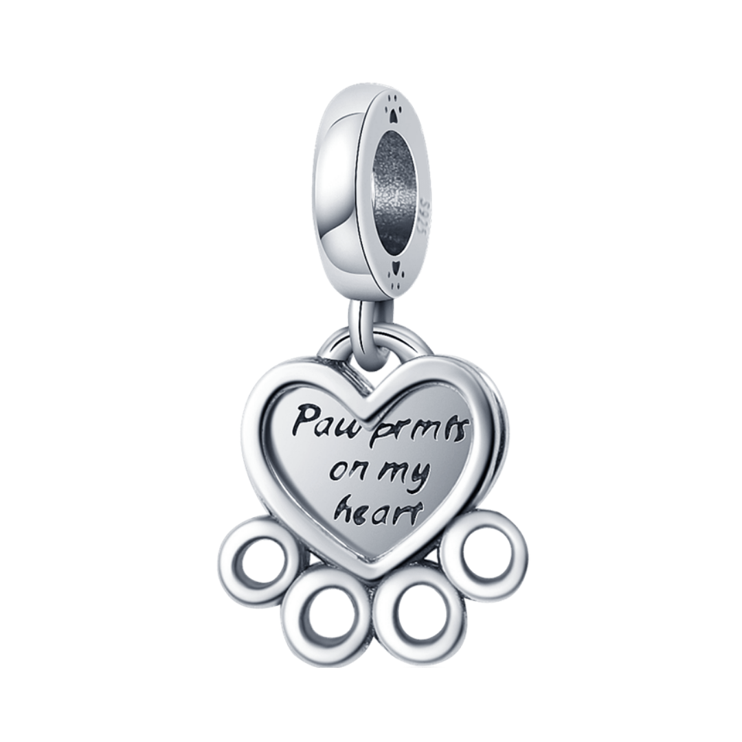 Paw Prints On My Heart Dangle Charm featuring a heart pendant and paw print design, perfect gift for dog lovers.