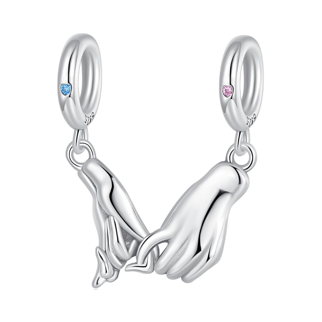 Pinky Promise Couples Split Pendant featuring two hands holding pinky fingers with blue and pink heart crystals.