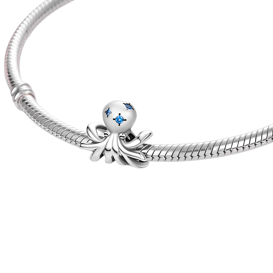 Blue Zircon Octopus Charm ( discontinued ) with sterling silver and blue zircon details, perfect for ocean lovers.
