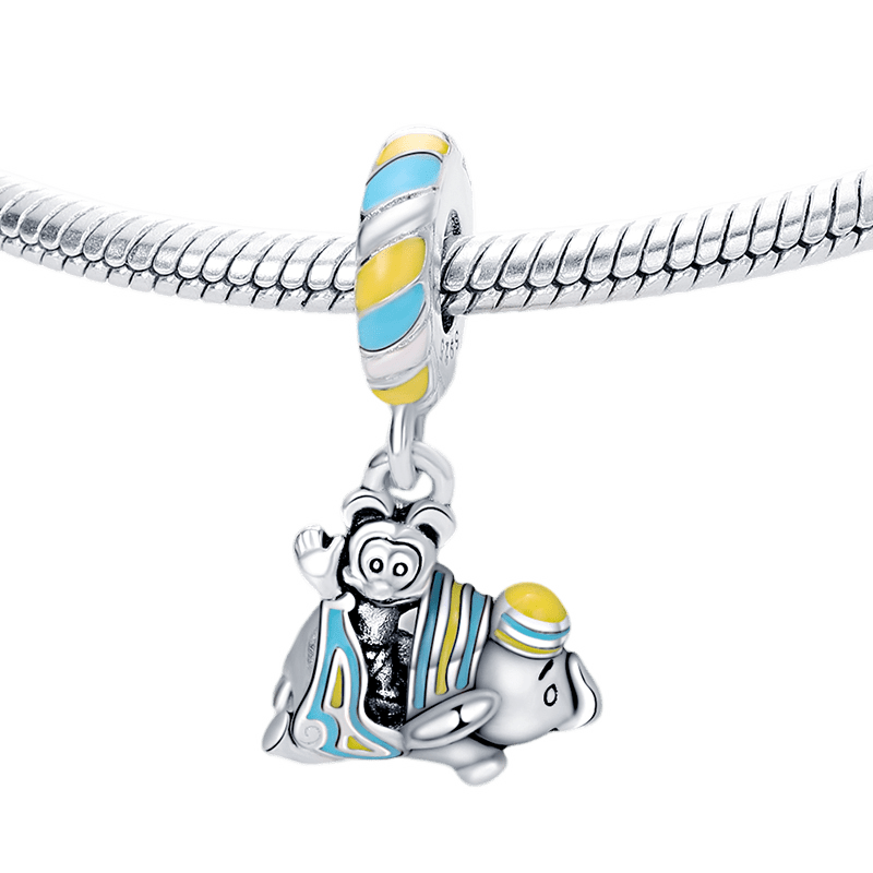 Disney Dumbo and Mickey Circus Dangle Charm (DISCONTINUED) featuring Dumbo and Mickey in vibrant colors.