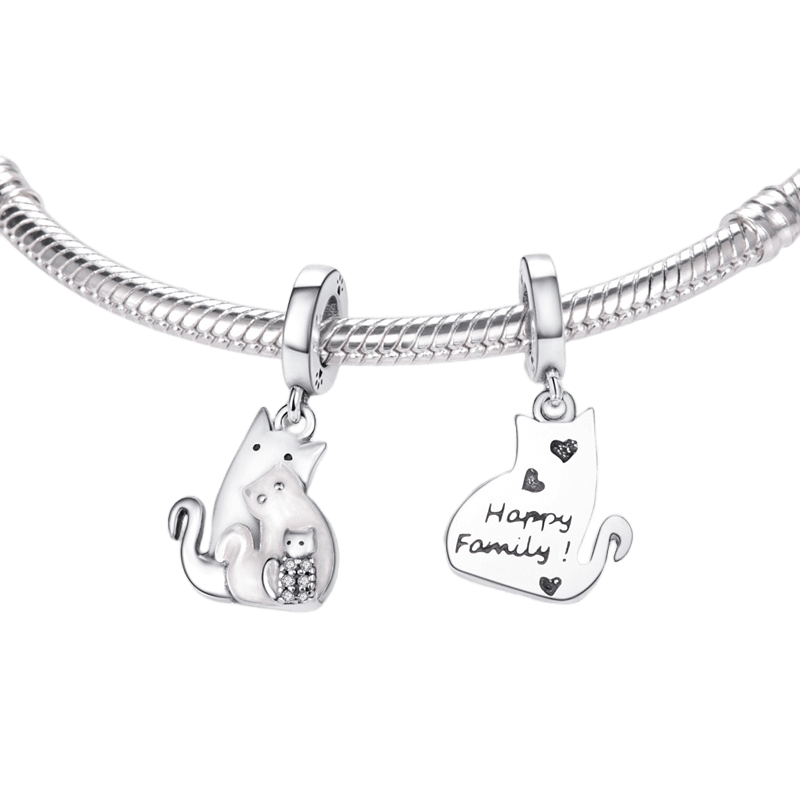 Cat Family Dangle Charm featuring two charming cat charms on a bracelet, symbolizing a happy family.