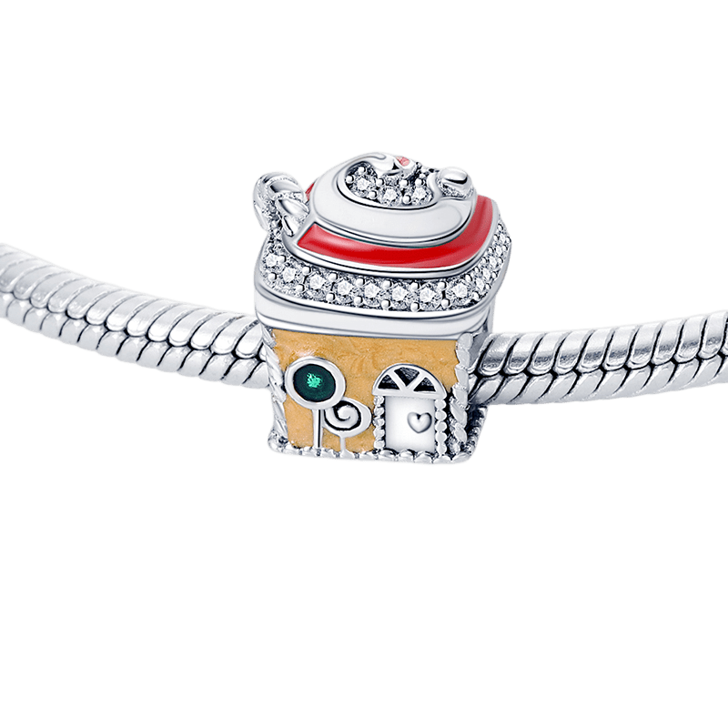Sweet Gingerbread House Christmas Charm featuring a gingerbread house design with a red roof and clear pavé stones.