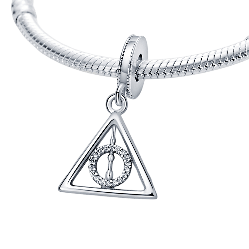 Harry Potter Deathly Hallows Dangle Charm on a silver bracelet, representing strength and magical storytelling.