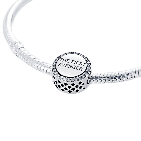 Marvel Captain America Shield Sparkling Charm featuring 'The First Avenger' engraved bead on a silver bracelet.