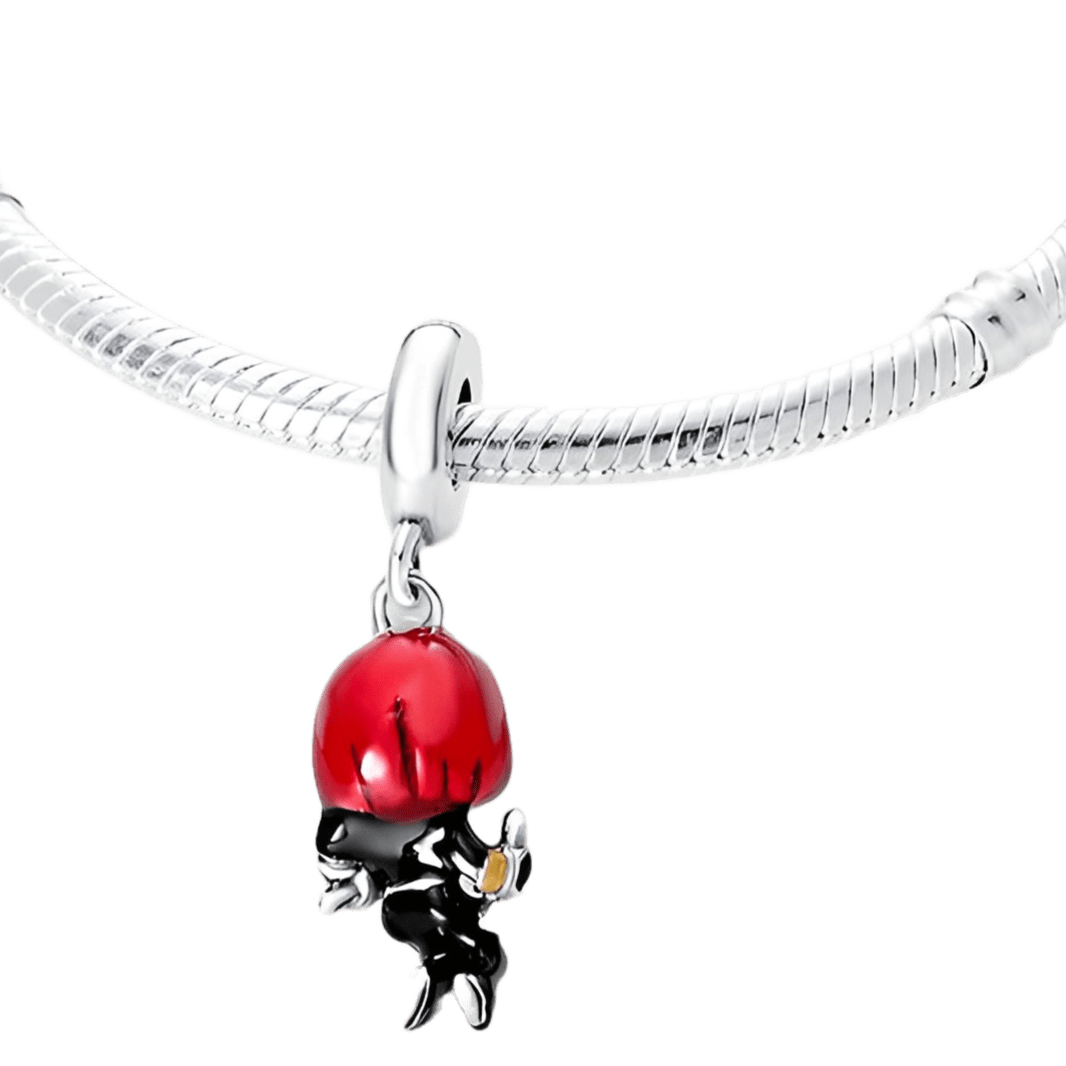 Marvel Black Widow Dangle Charm featuring red enamel hair and tactical suit, showing her dynamic action pose.