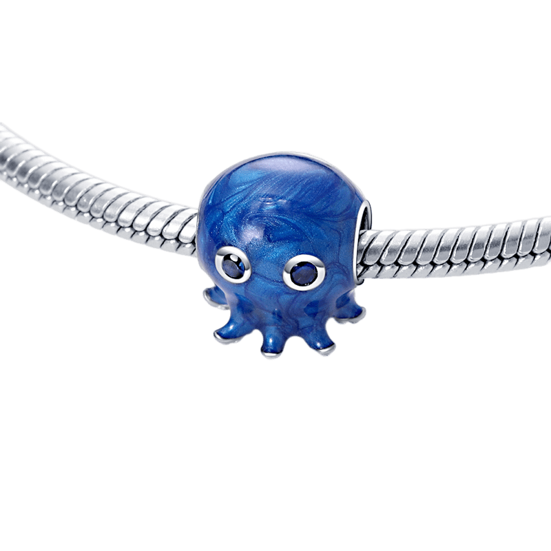 Blue Bubbles the Octopus Charm on a silver bracelet with vibrant blue enamel and silver tentacles.