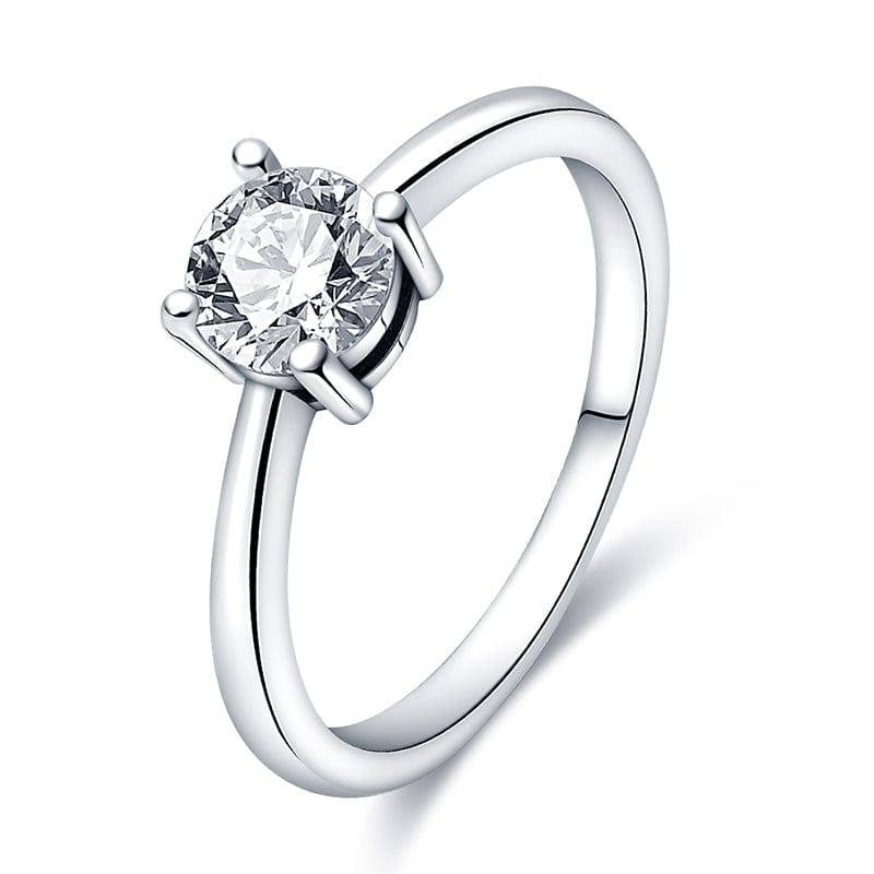 Classic Solitaire Sparkle Ring ( Discontinued ) featuring a round-cut zircon in a sleek four-prong sterling silver setting.