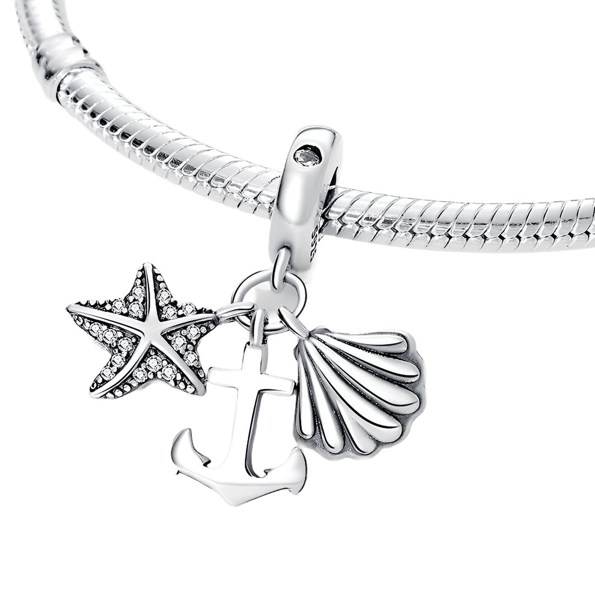 Ocean Anchor, Seashell & Starfish Dangle Charm ( Discontinued ) showcased on a silver bracelet with a starfish, anchor, and seashell.