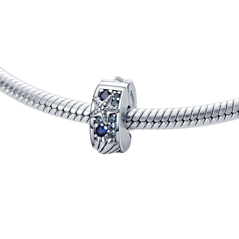 Ocean Starfish and Seashell Clip Charm showcasing detailed starfish and aqua stones on a bracelet.