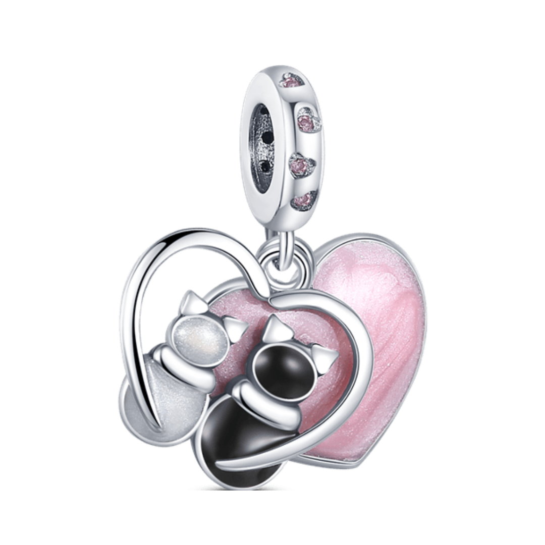 Purrfect Pair Heart Dangle Charm featuring two cat faces and a pink enamel heart, embellished with crystals.