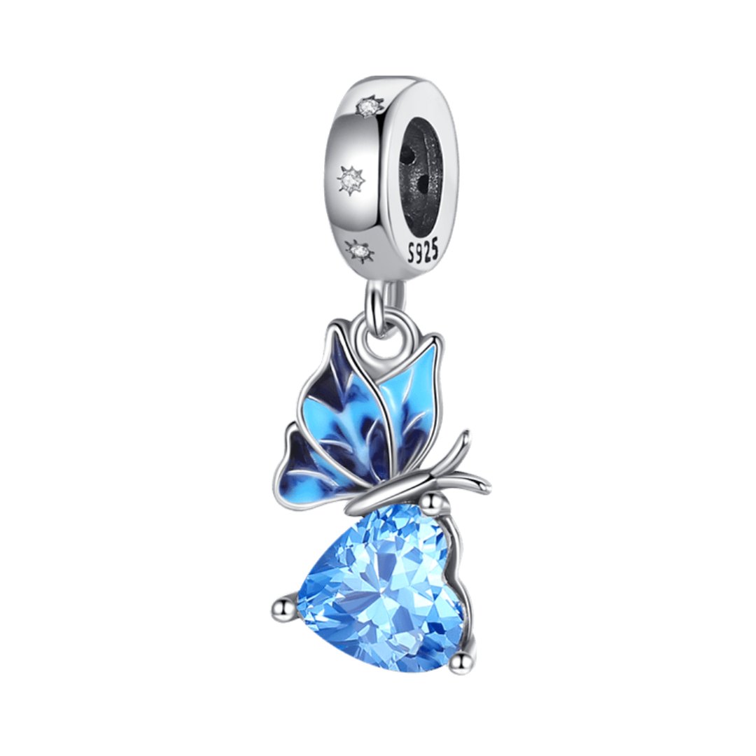 Radiant Blue Butterfly Heart Dangle Charm featuring a blue butterfly and a shimmering heart gem.