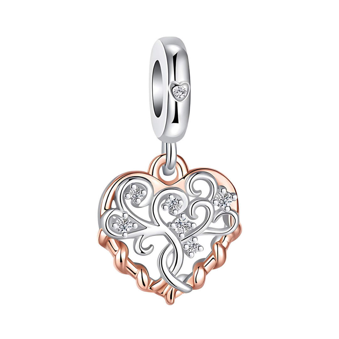 Rooted in Love Family Tree Heart Dangle Charm featuring intricate silver filigree and rose gold details.