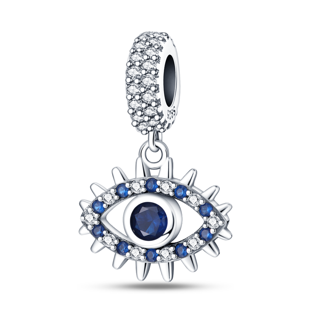 Sapphire Blue Evil Eye Dangle Charm featuring a deep blue center, silver spikes, and sparkling gems.