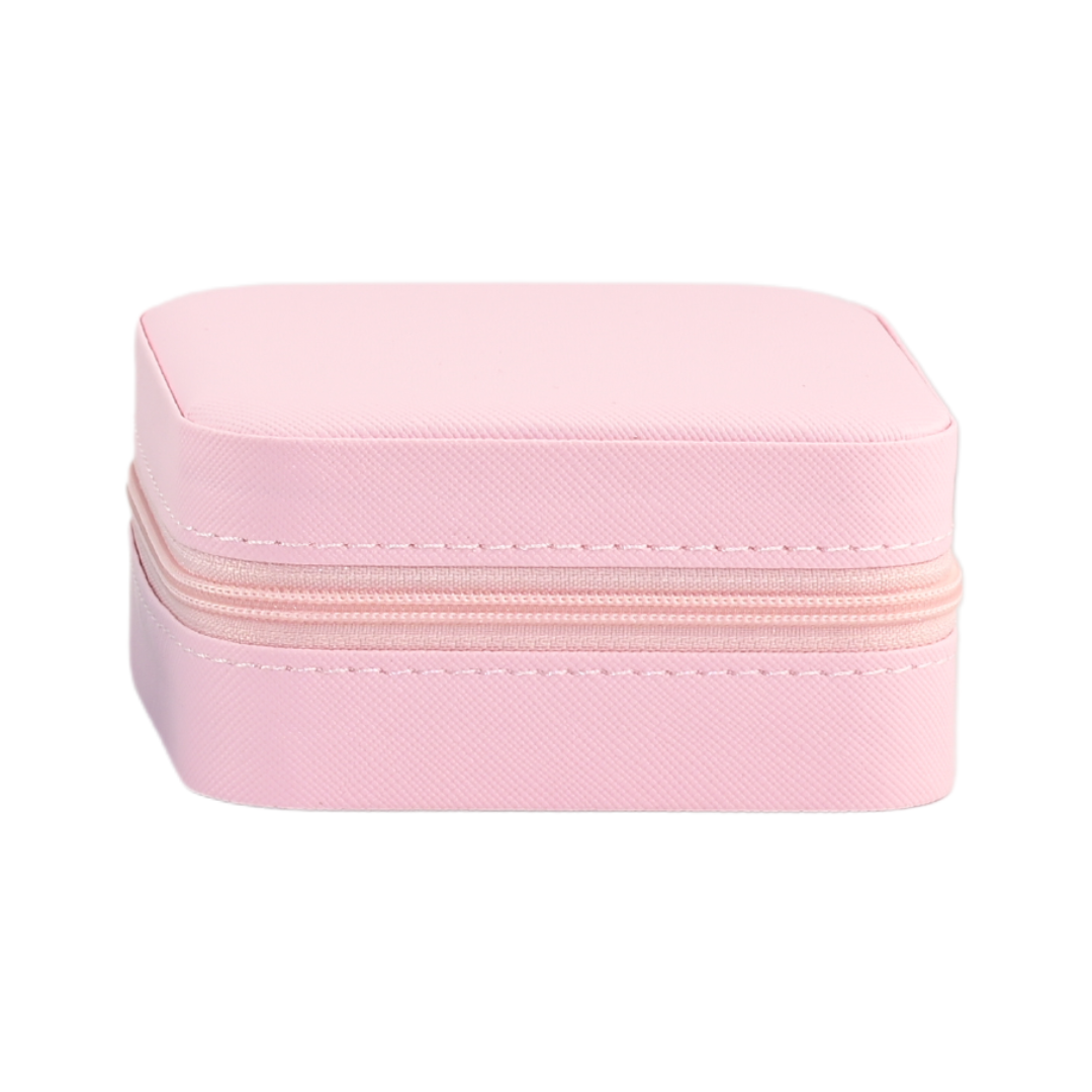 Small Jewelry Box in soft pink, designed for travel and storing charms, rings, and earrings securely.