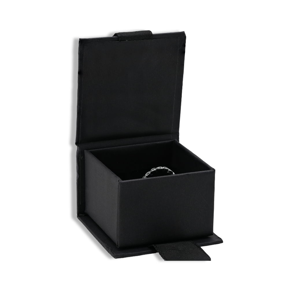 Small Jewelry Gift Box opened to display a ring, elegant and compact for charms and rings.