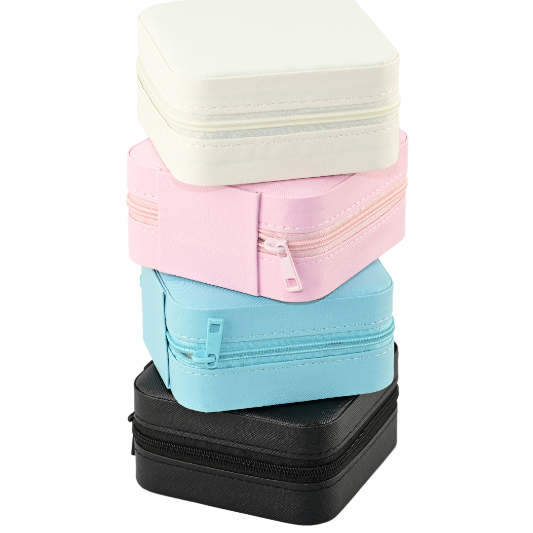 Stack of Small Jewelry Boxes in pastel colors and black, perfect for storing charms and accessories.