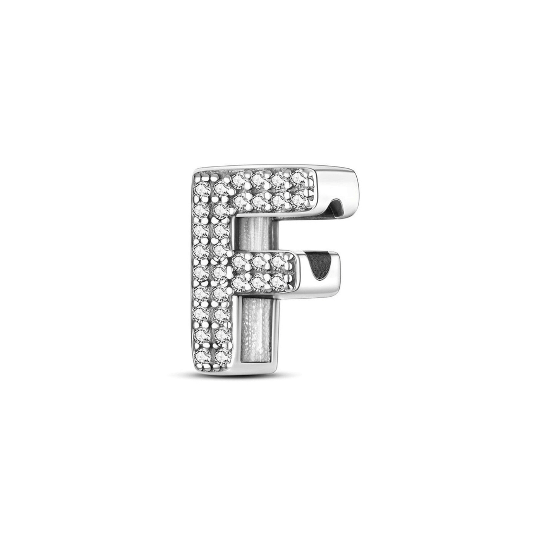 Sparkling Alphabet Charms silver charm shaped as the letter F, adorned with pavé stones, catching the light beautifully.