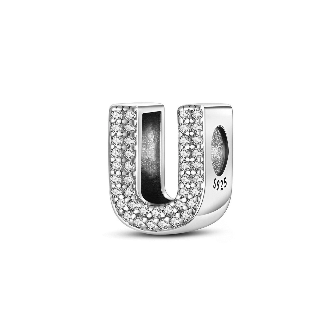 Sparkling Alphabet Charms: Silver charm letter U adorned with clear pavé stones for a unique, personalized bracelet.