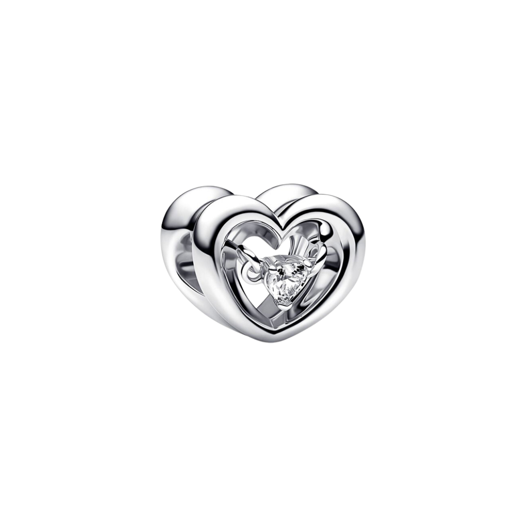 Sparkling Floating Heart Charm featuring a polished open silver heart with a floating heart-cut stone.