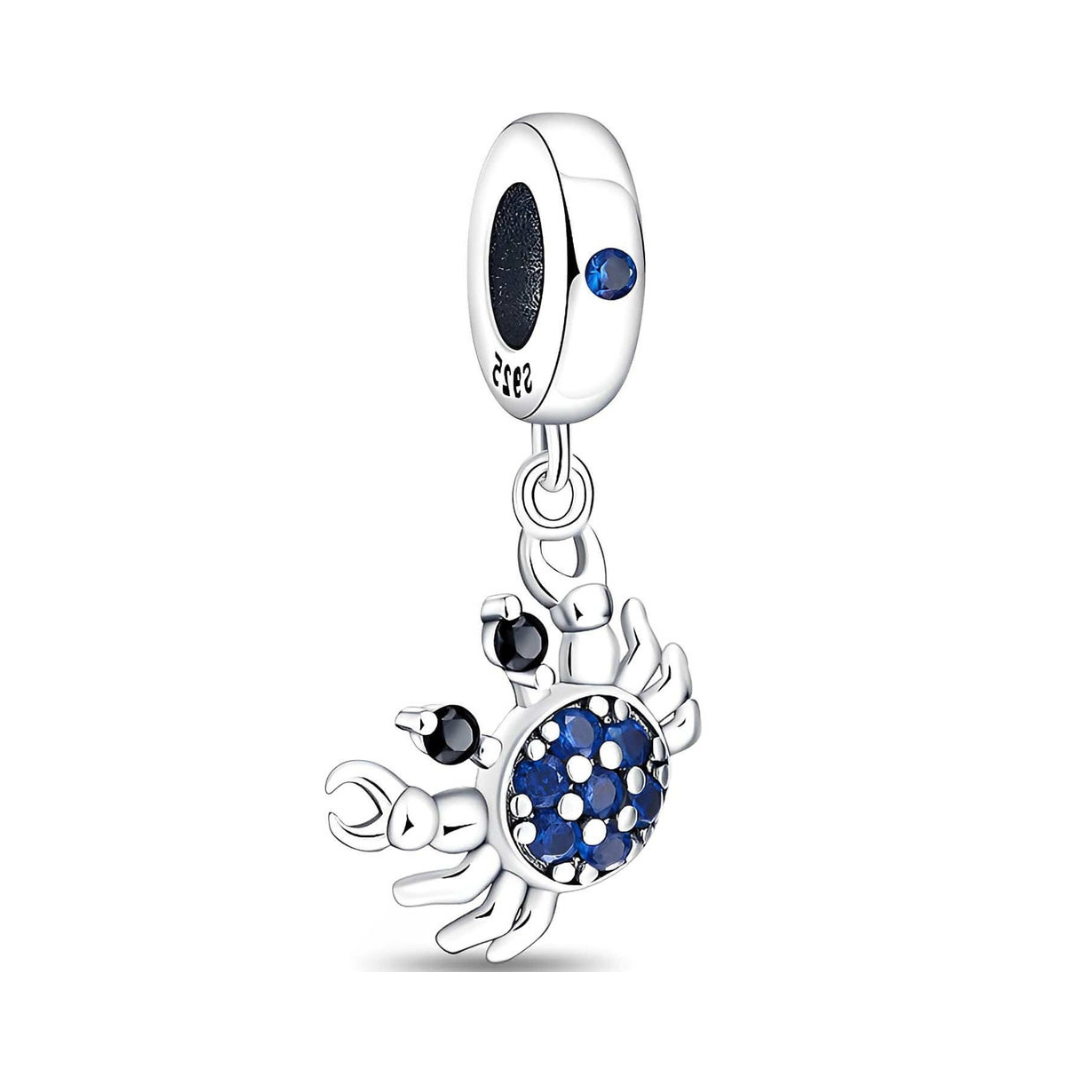 Sparkling Ocean Crab Dangle Charm featuring blue pavé stones and silver detailing, perfect for ocean lovers.