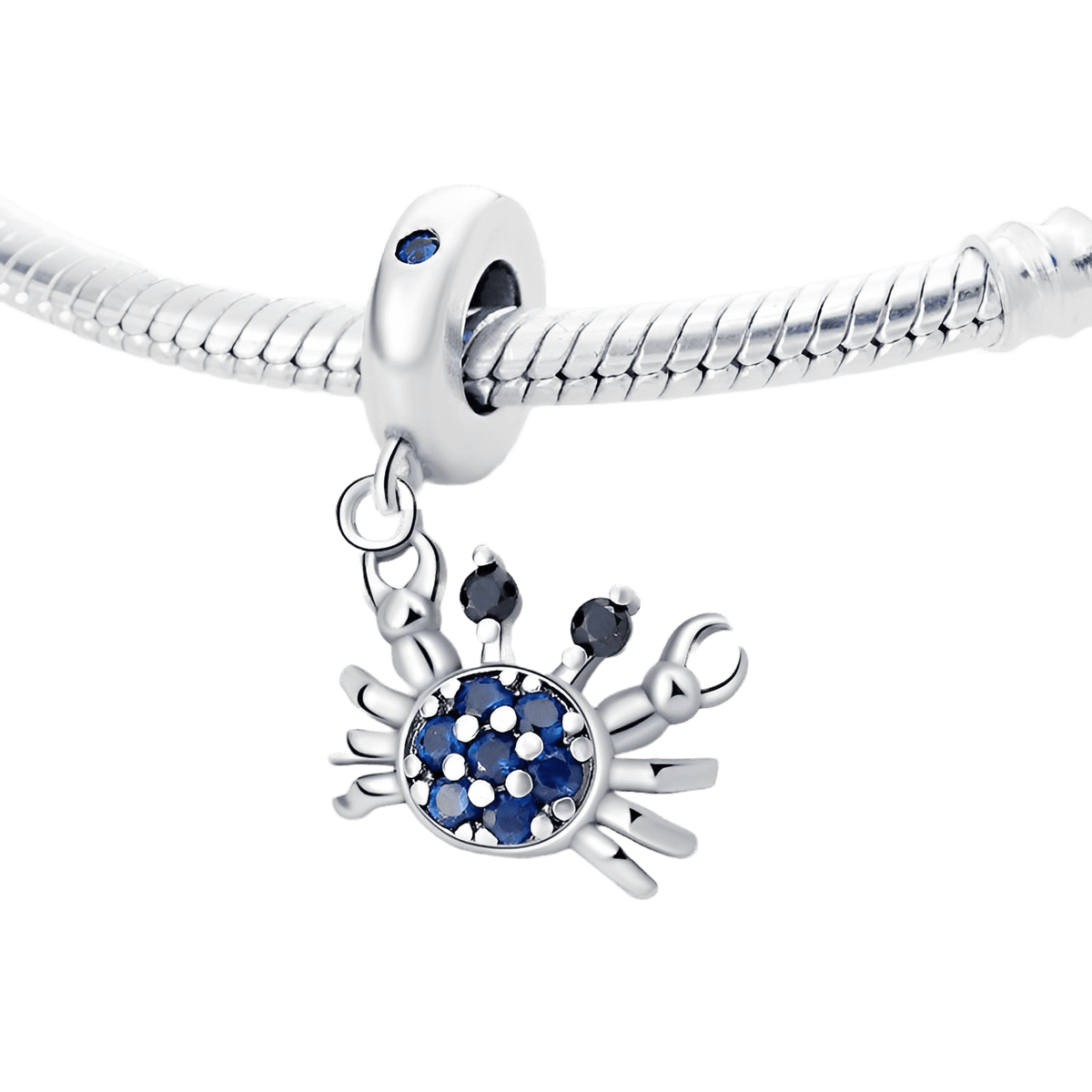 Sparkling Ocean Crab Dangle Charm featuring blue pavé stones and silver details on a bracelet.