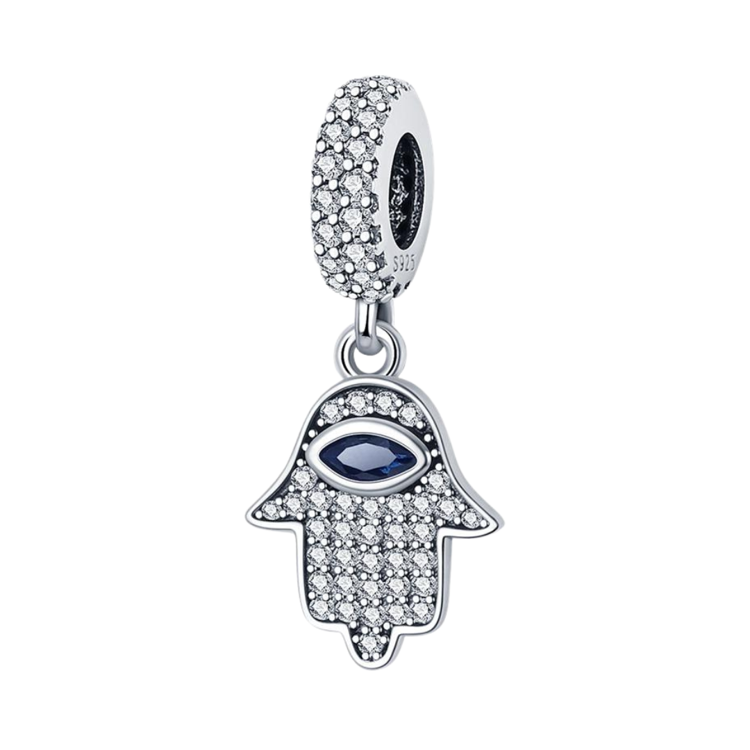 Sparkling Pave Hamsa Evil Eye Dangle Charm featuring sparkling white stones and a deep blue evil eye centerpiece.