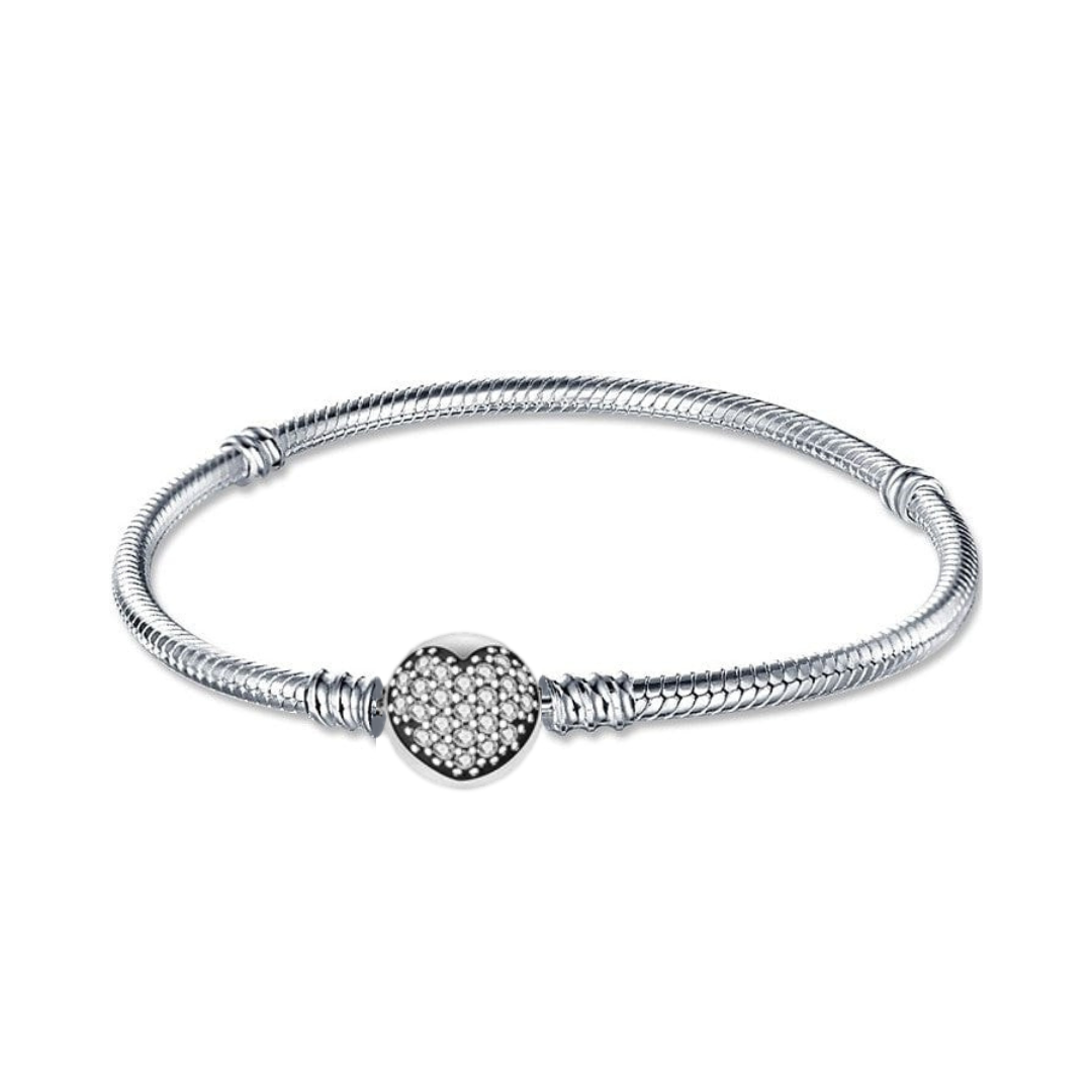 Sparkling Pavé Heart Snake Chain Bracelet featuring a heart-shaped clasp adorned with tiny crystals.