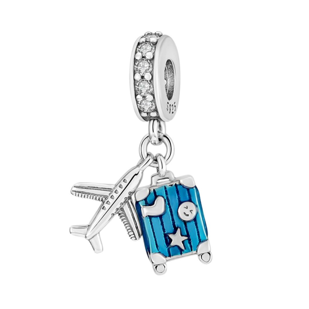 Sparkling Plane & Suitcase Travel Dangle Charm featuring a silver plane and blue suitcase with sparkling details.