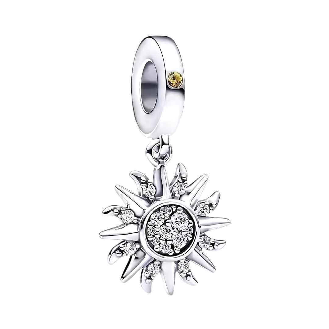 Sparkling Silver Sun Dangle Charm featuring a radiant sun design with sparkling clear stones and a golden bale.
