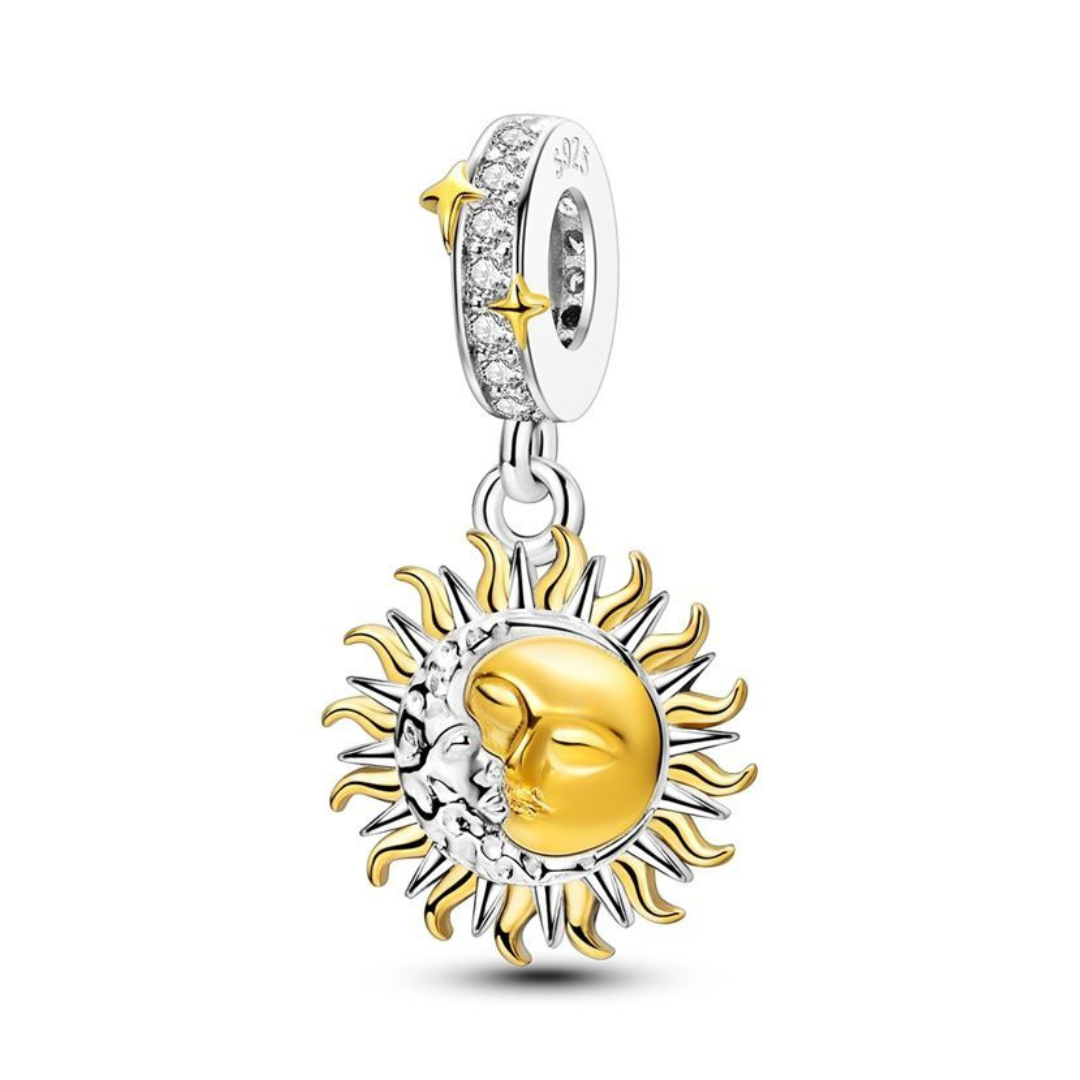 Sun and Moon Harmony Dangle Charm featuring a stunning sun and moon design with celestial elements.