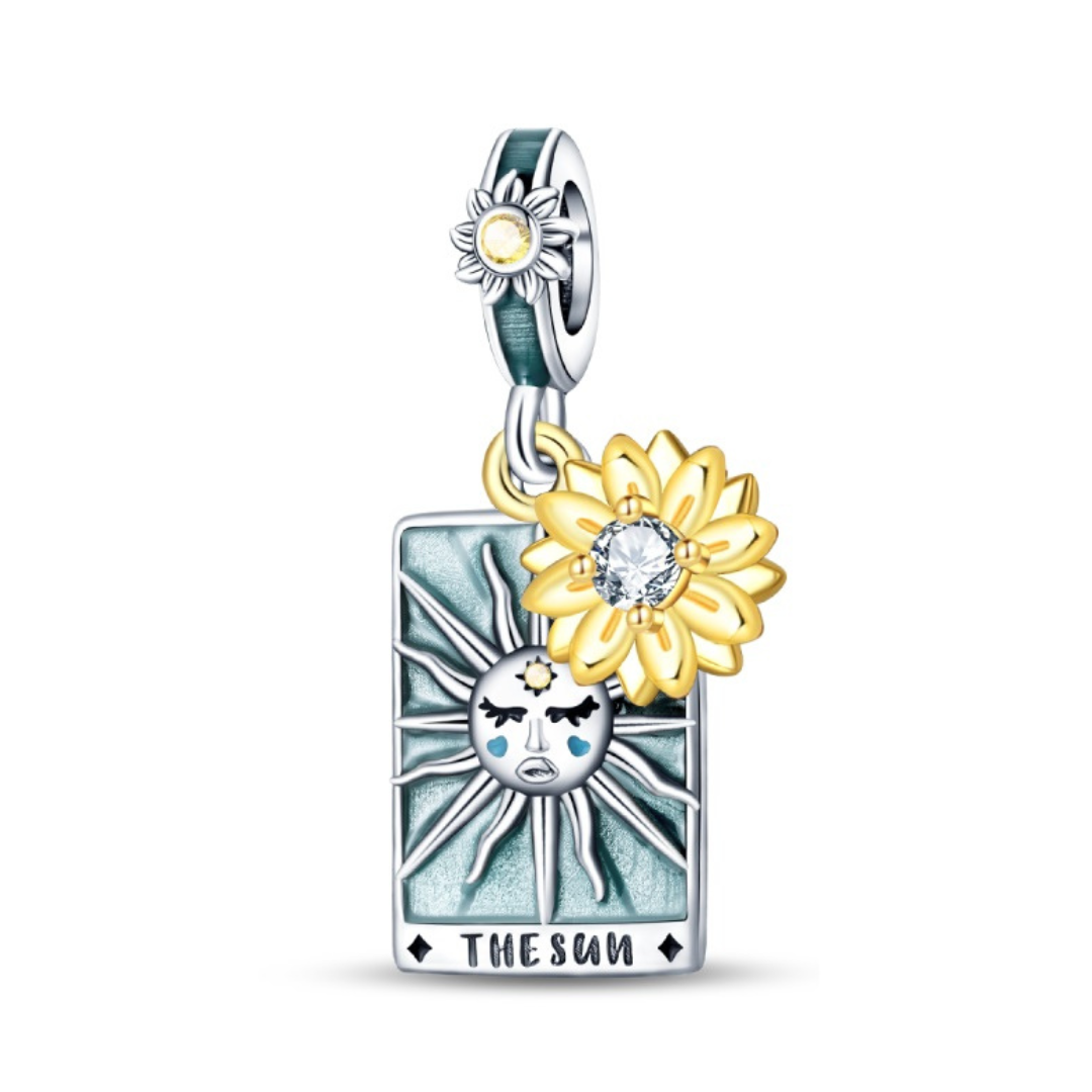 The Sun Tarot Card Dangle Charm featuring a vibrant sun design and yellow flower accents.