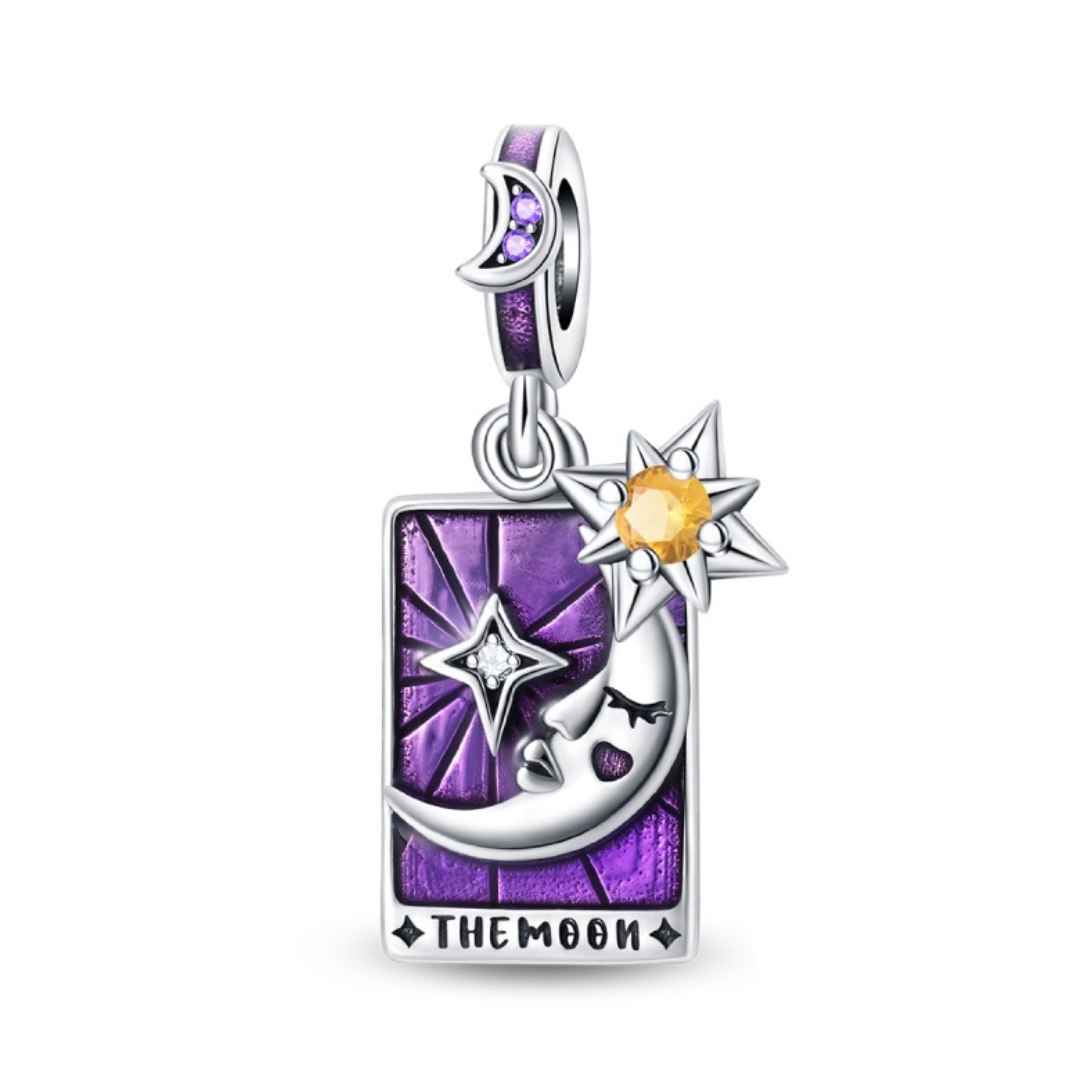 The Moon Tarot Card Dangle Charm featuring a moon, star, and purple design, perfect for intuition and self-discovery.