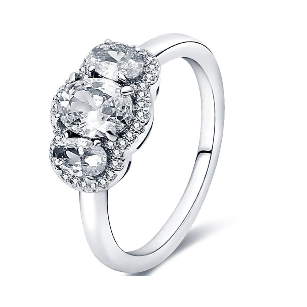 Three Stone Halo Sparkle Ring ( Discontinued ) featuring dazzling zircon stones in a halo setting.