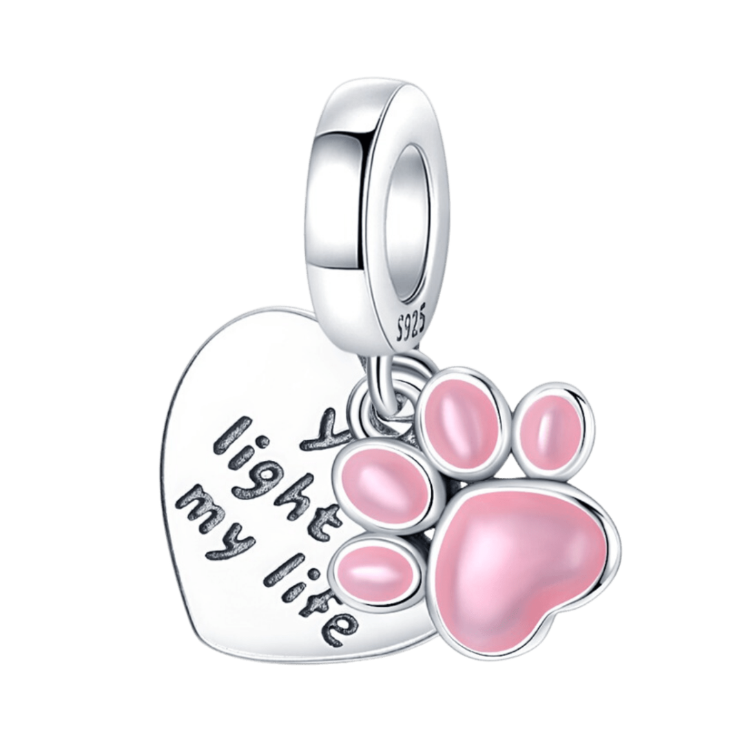 You Light My Life Paw Print Glow In The Dark Dangle Charm featuring a heart and pink enamel paw print.